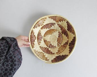 vintage woven wall basket / geometric wall hanging basket / round raffia basket