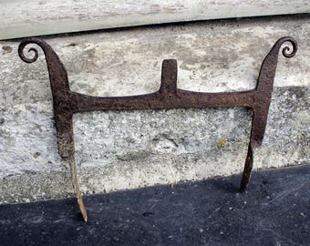 An 18th century wrought iron boot scraper