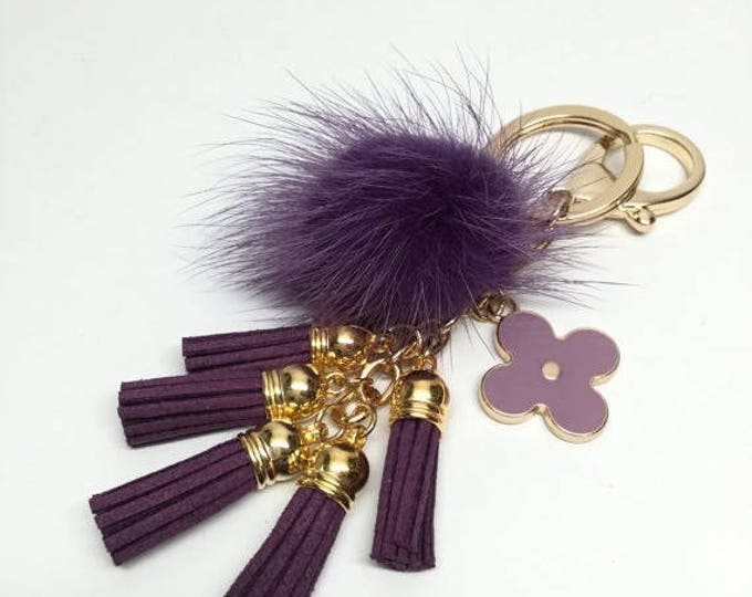 Cute Genuine Mink Fur Pom Pom Keychain bag charm with suede tassels and flower charm in Deep Purple