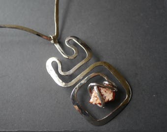 Chunky modernist abstract pendant on beaten metal choker, 1970s vintage with polished gemstone