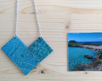 Long necklace made from recycled paper taken from an image of Salento