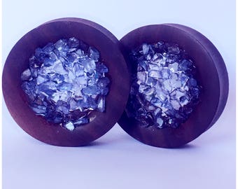 Wood and amethyst stone plugs, ear stretchers, ear guages, ear plugs.