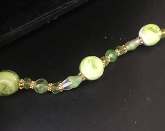 Beaded green and gold bracelet