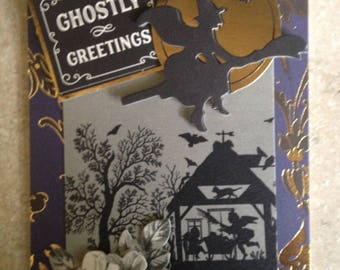 Halloween Card/Handmade Card/3D/a touch of Floral/Features a Witch Flying over a Very Creepy House/Has a Greeting and a Touch of Floral