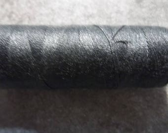 Sewing thread spool dark grey