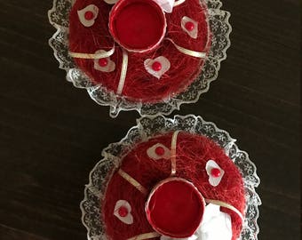 Red and white candle holders