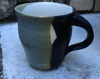 Wheel thrown stoneware pottery mug with handle