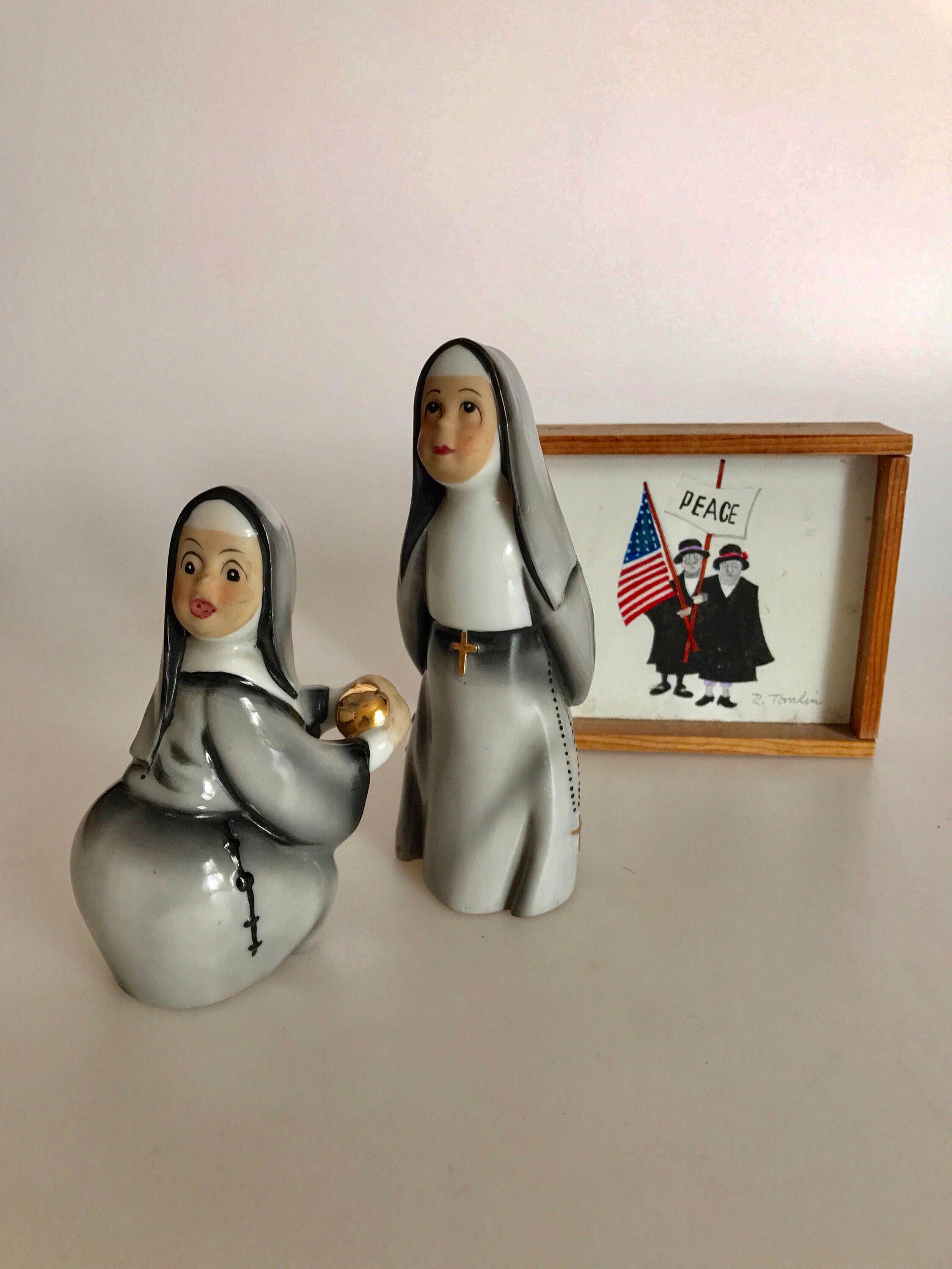 vintage porcelain baseball nun figurines