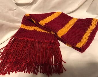 Hogwarts House Scarves. Gryffindor, Slytherin, Ravenclaw, Slytherin, Newt Scamander.