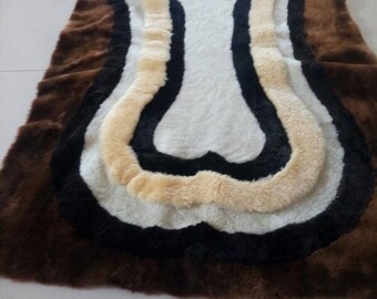 Dog bone sheepskin rug. handmade, multi color patchwork rug