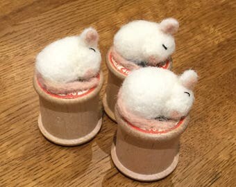 Tiny needle felt mouse on a vintage wooden cotton reel. This miniature mouse is made from Shetland wool.
