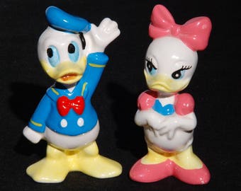 donald and daisy duck figurines