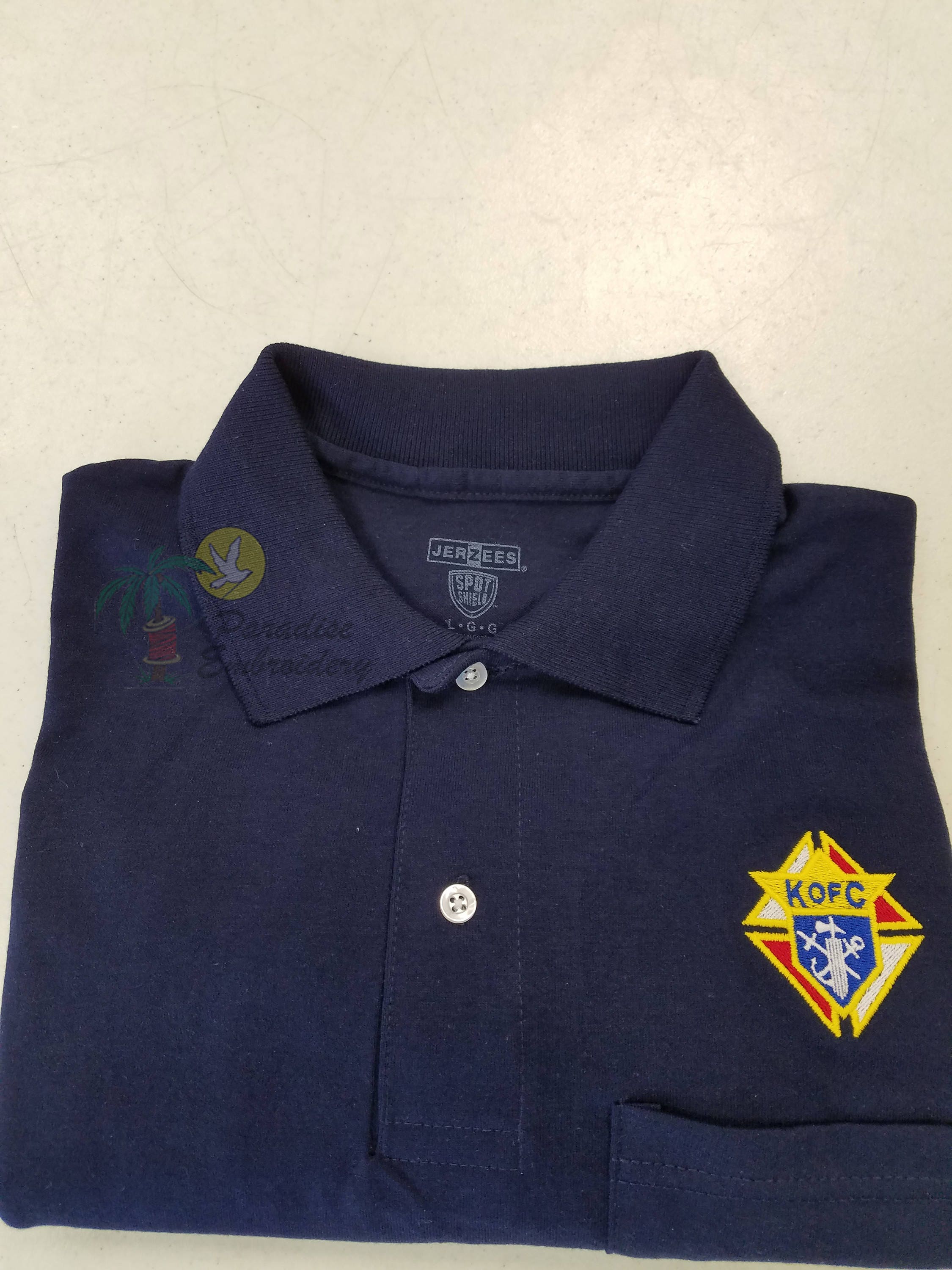 Knights of columbus pocket polo shirt with logo only.