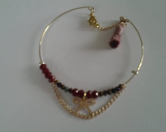 Gold plated Bangle has charms