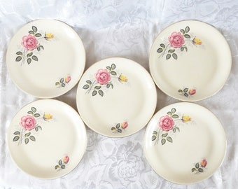 14 Rose Marie plates by Alfred Meakin