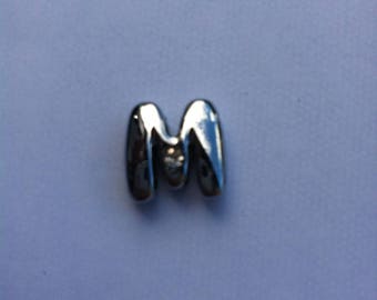 Charm in silver letter "M"