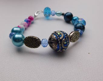 Ornate blue and gold bracelet