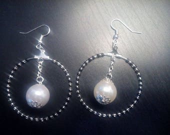 hoop earrings decorated with seed beads