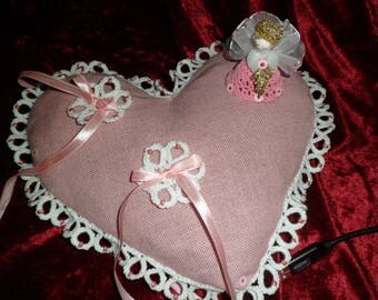 display with Angel wedding rings