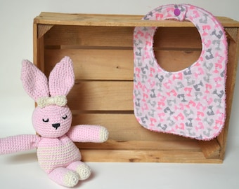 Pink bib with colorful little foxes