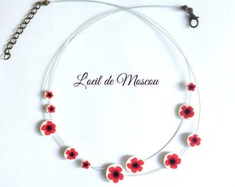 red poppy Flower necklace on shrink plastic
