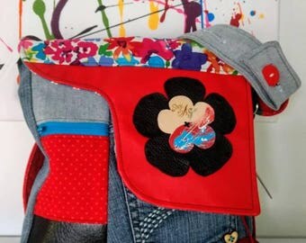 Red handbag with floral pattern of creation by bag