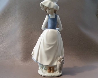 Nao Lladro Girl & Poodle titled "Cheer Me Up" - NAO catalogue number 02000397 produced from 1992 and retired 1998