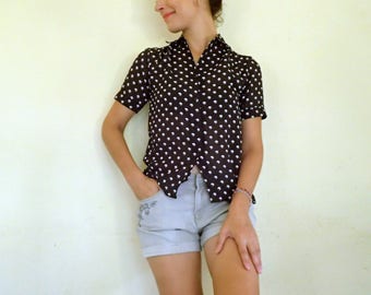 black polkadot shirt