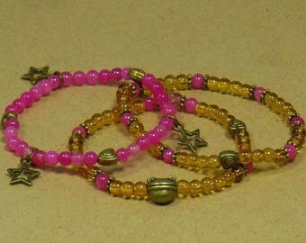 Pink and gold frog bracelet