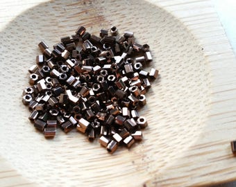 100 beads 2 mm + Czech seed beads