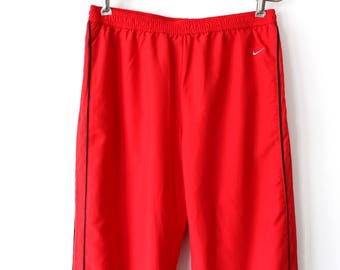 red nike joggers