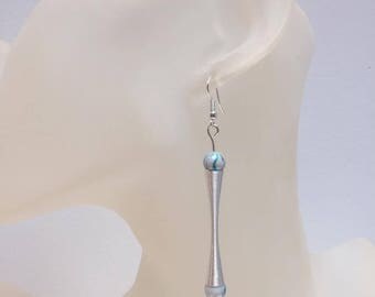 These earrings is 2 mottled blue beads