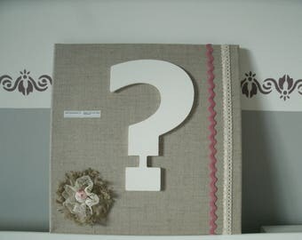 table with a point of punctuation, linen flower and lace