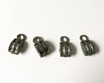 metal pulley mini pulleys set of 4 tiny pulleys industrial decor rusty metal pulleys itty bitty