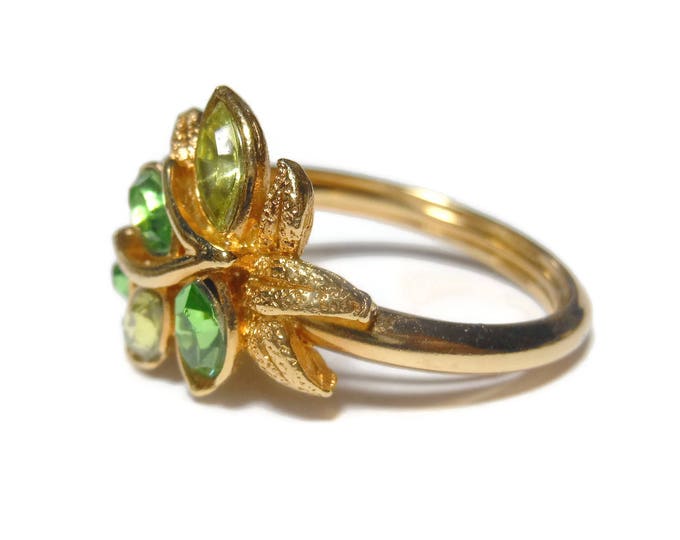 Avon Leaf Lights Ring, adjustable from 6 to 8, 1974 green marquis cut faux emerald & Peridot rhinestone leaves, gold tone setting