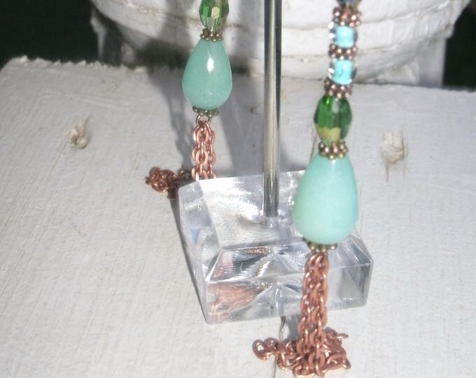 Boho Earrings, a little random, a little classy and a lot one of a kind! Blues , greens and copper and bronze with chain fringe bottoms