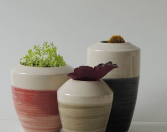 three ceramic vases 17-228