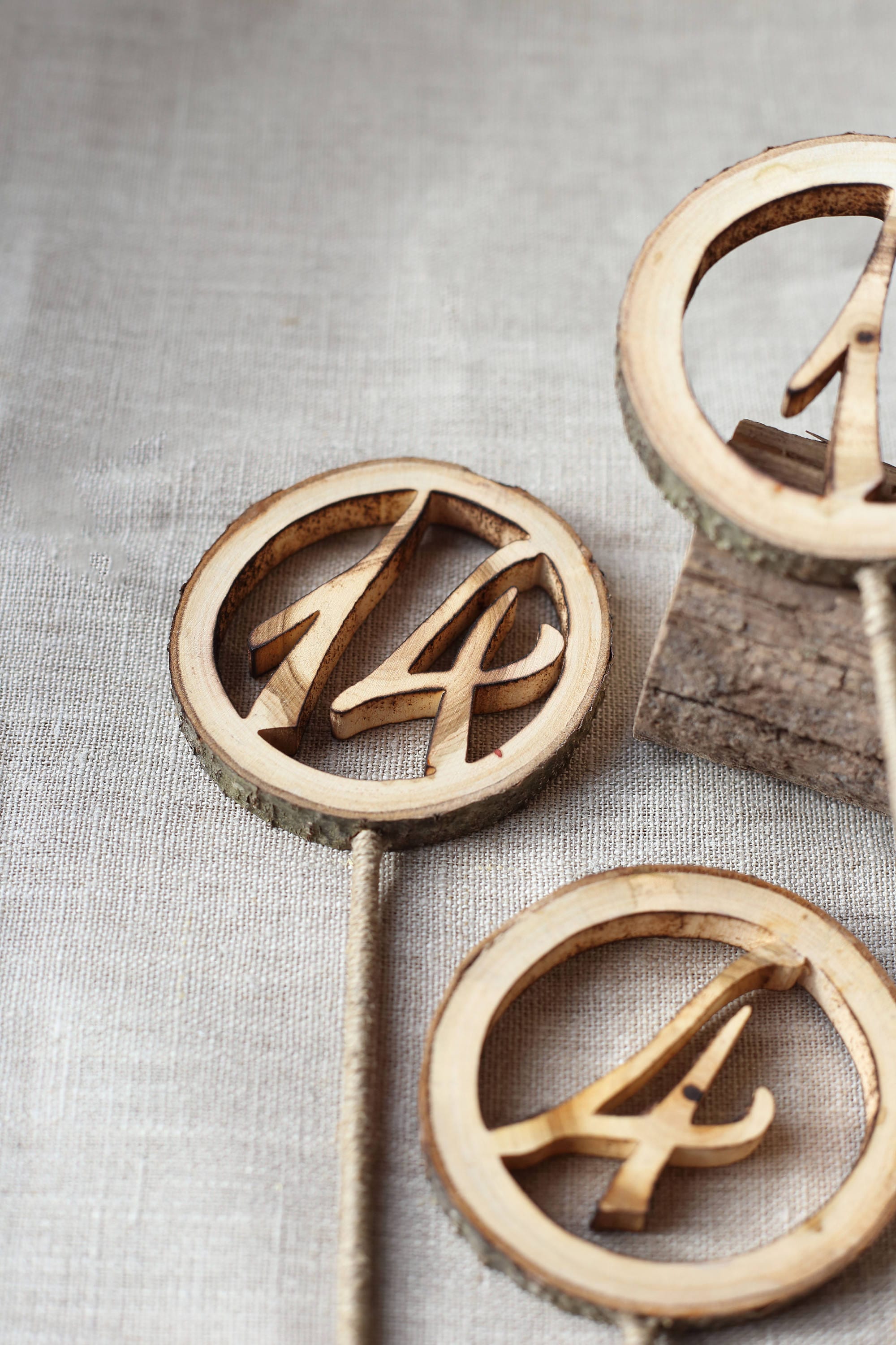 wooden-table-numbers-on-sticks-wedding-table-number-rustic