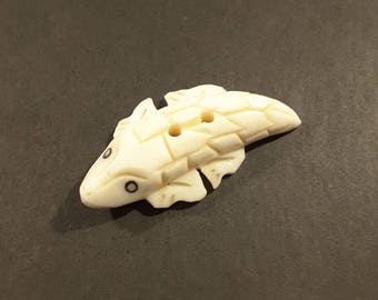 Hand carved bone lizard button.