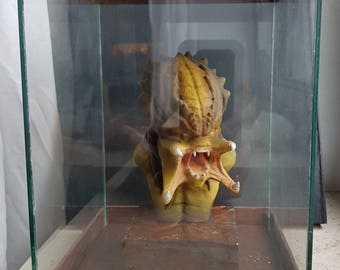 Predator bust, figurine in glass case