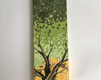 Torn paper on wood. 'Summer Tree'