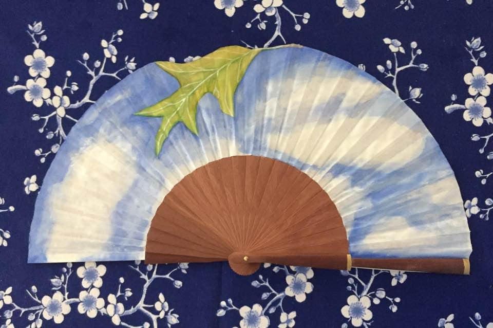 Handfan poem e e cummings a leaf falls