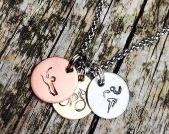 triathlon necklace 3 metals