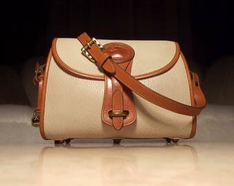 Dooney & Bourke Vintage 1990s All Weather Leather Medium R25 Bone/British Tan Crossbody Handbag: Classic Cool, Natural Beauty