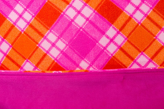 pink and orange throw blanket
