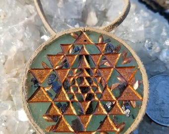 Sri yantra orgonite glow in the dark crystal pendant