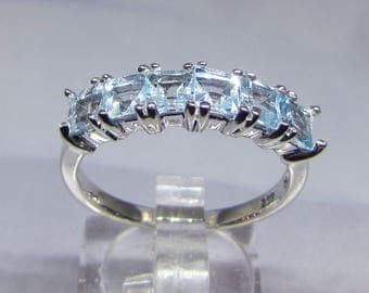 Ring Blue Topaz stones on silver size 54