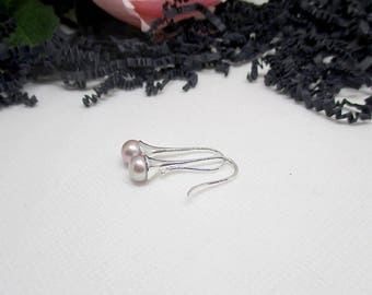 Genuine natural freshwater pearl earrings.