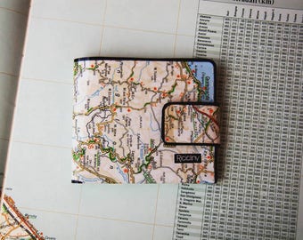 Wallet with geographical Atlas