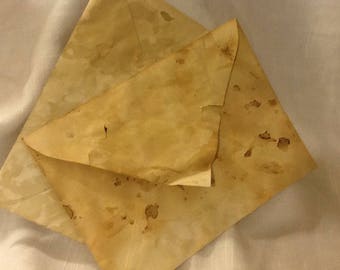 10 coffee stained envelopes